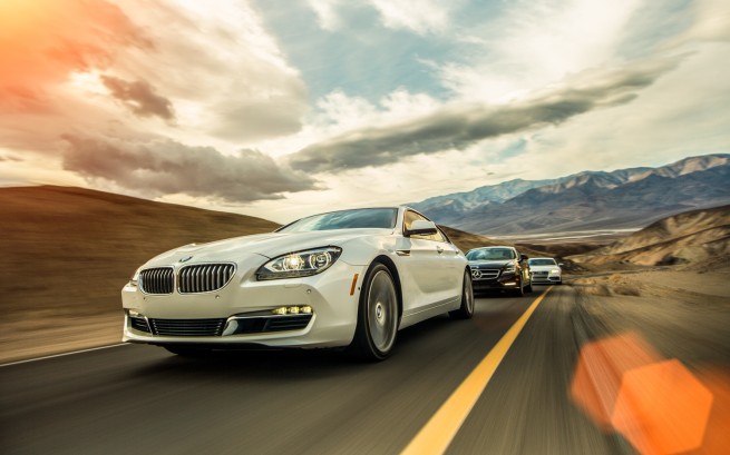 Audi-S7-BMW-650i-Gran-Coupe-Mercedes-Benz-CLS550-front-three-quarters-in-motion-655x409