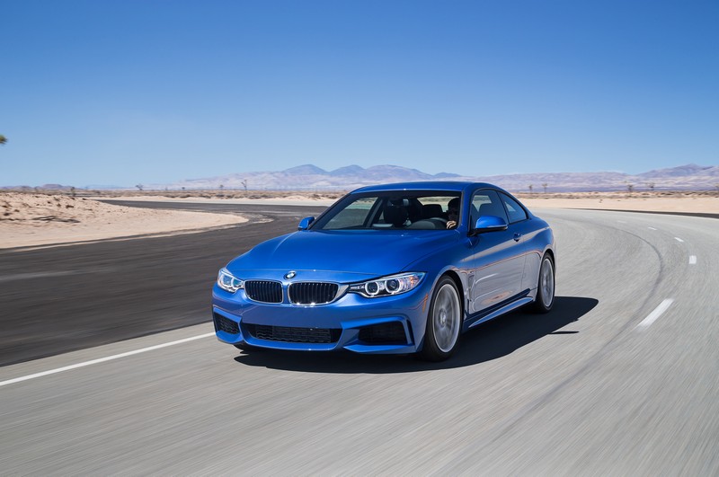 2014-BMW-428i-front-three-quarters-in-motion-02