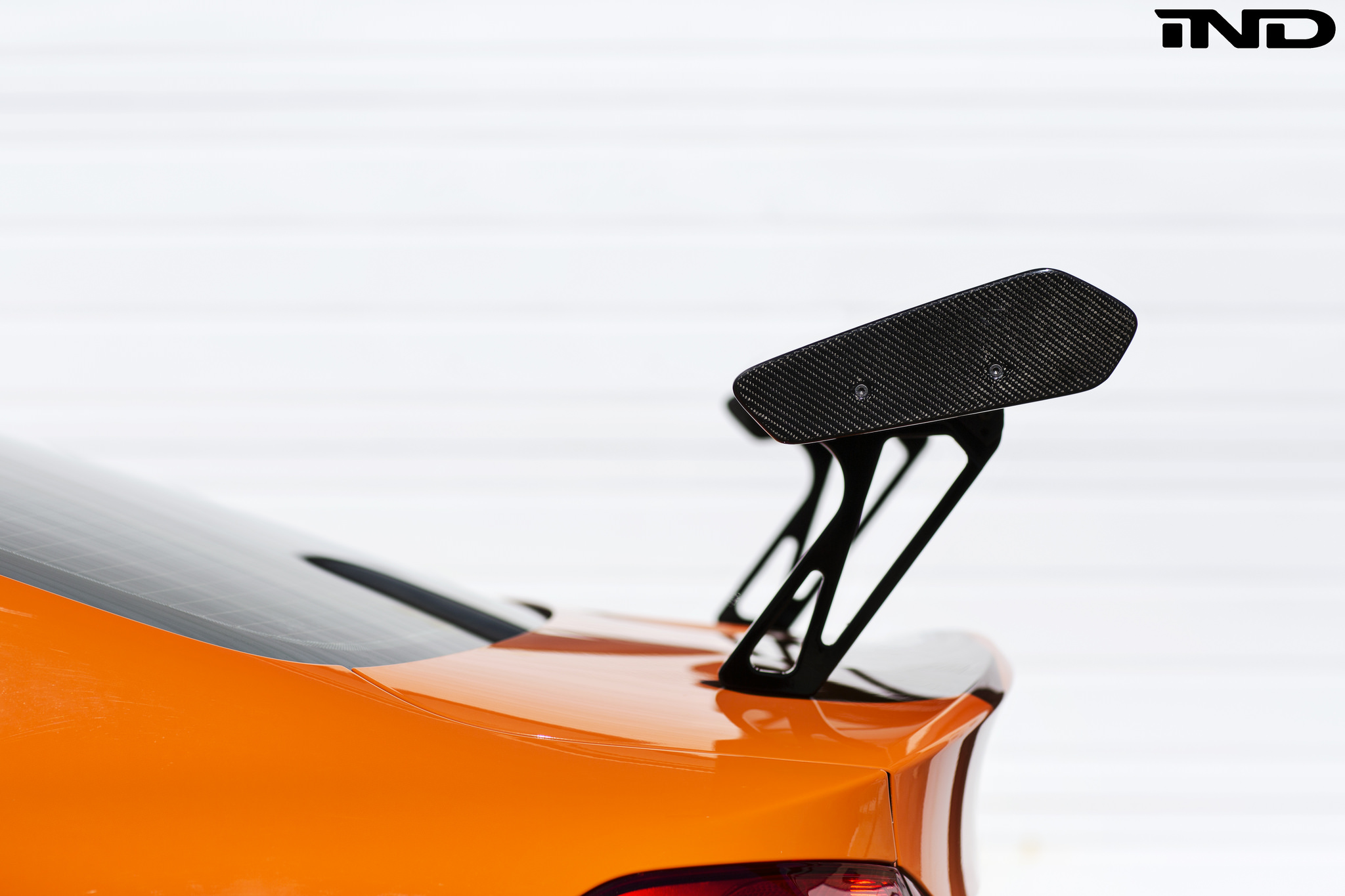 iND Distribution Mods a Fire Orange BMW M4